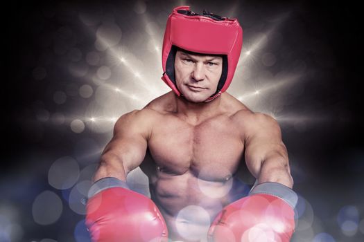 Composite image of portrait of boxer with red gloves and headgear