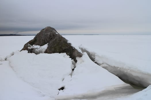 seascape rock under the ice