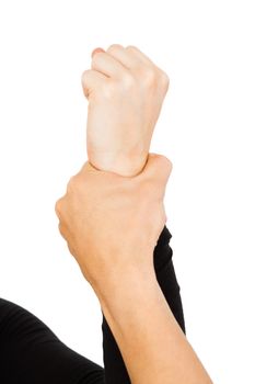Close-up of hand holding wrist