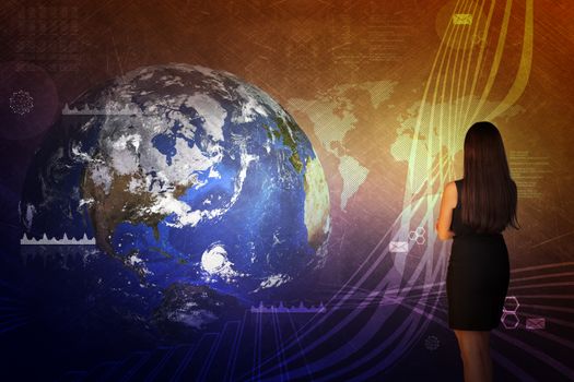Businesswoman in front of world map