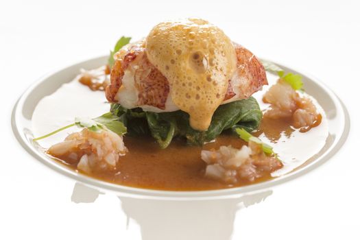 Butter poached lobster with coconut curry broth