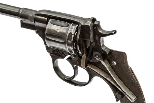 Disassembled revolver, pistol mechanism, isolated on white backg