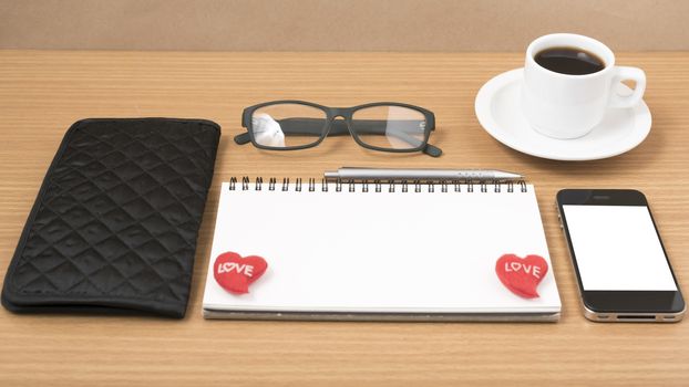 office desk : coffee with phone,notepad,eyeglasses,wallet,heart