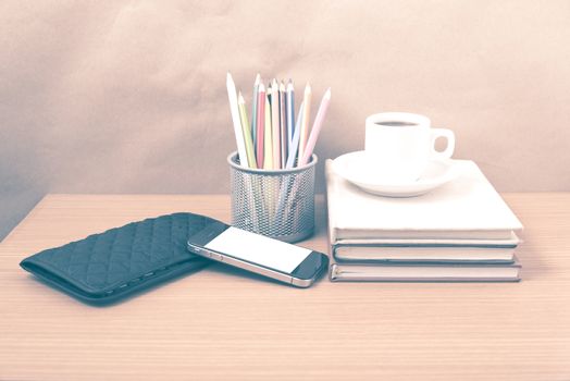 office desk : coffee with phone,stack of book,wallet,color box v