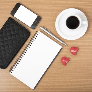 working table : coffee with phone,notepad,wallet and red heart