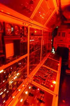 control room orange red light 
