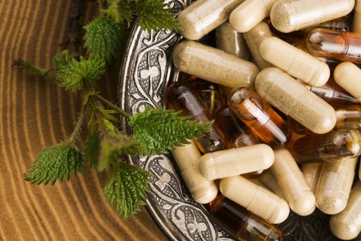 pills with herbs, macro