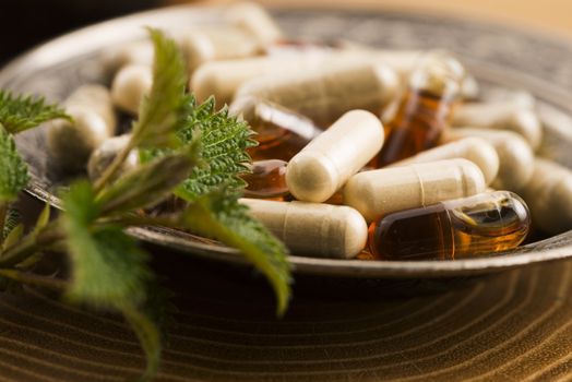 pills with herbs, macro