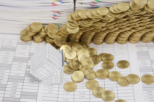 Close up bankruptcy house have gold coins collapse