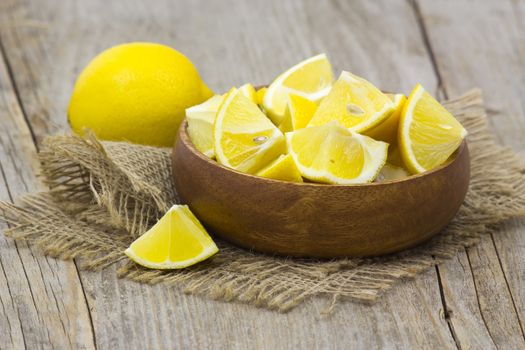 fresh lemons in a bowl 