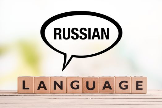 Russian language lesson sign on a table