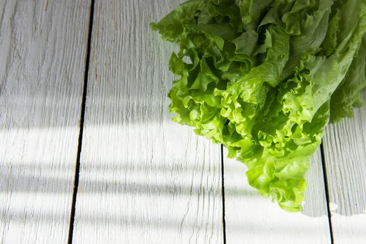 lettuce salad on a wood