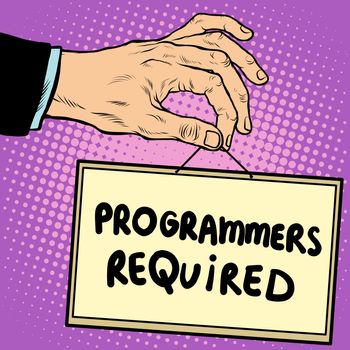 Hand holding a sign programmers required