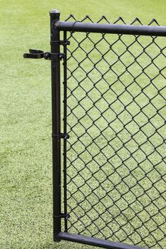 Chain-link fence gate at ball park