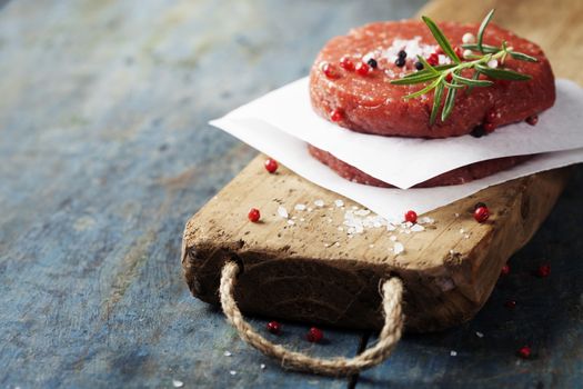 Raw Ground beef meat Burger steak cutlets with seasoning
