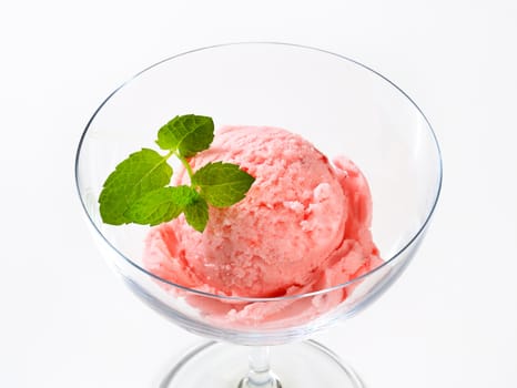 Fruit-flavored ice cream in a coupe
