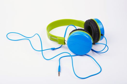 Blue with green Headphones on a white background