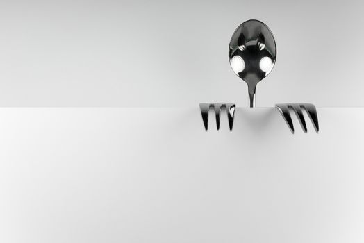 Metal spoon and two forks formed into conceptual fantasy figure
