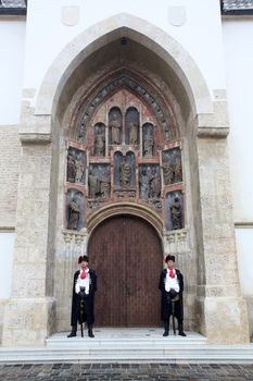 Guard of Honor of the Cravat Regiment on the south portal of the church of St. Mark in Zagreb, Croatia