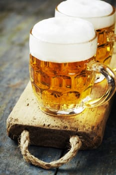  beer on wood background with copyspace