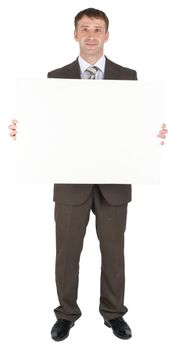 Businessman behind blank paper