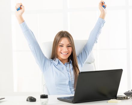 Happy Bussineswoman In Front Of Laptop