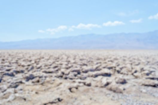 Defocused background of Devil's Golf Course in Death Valley, Cal