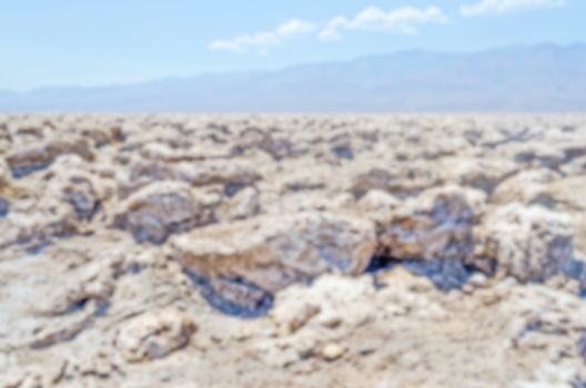 Defocused background of Devil's Golf Course in Death Valley, Cal