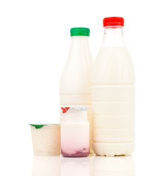 milk, dairy products and yogurt in the plastic bottle on white b