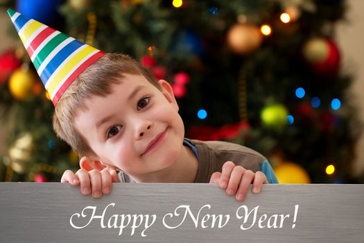 Happy New Year 2016 - boy on a Christmas tree background