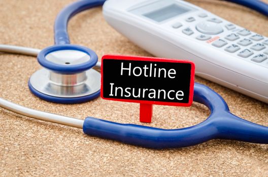 Phone and stethoscope with Hotline insurance.
