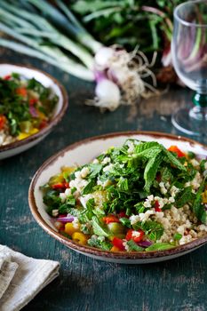 Plates of refreshing bulgur and vegetables salad