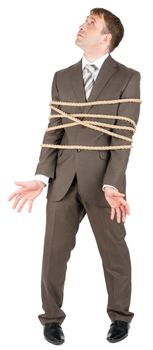 Businessman tied with rope