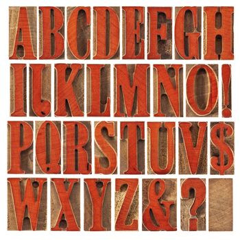 wood type alphabet stained by red