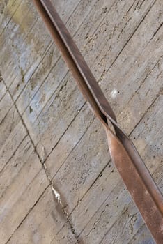 Industrial rusted steel strip and concrete
