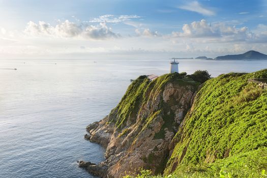 Hong Kong lighthouse during sunrise , Hok Tsui Cape D'Aguilar beautiful landscape