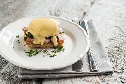 eggs Benedict in the context of a hollandaise sauce