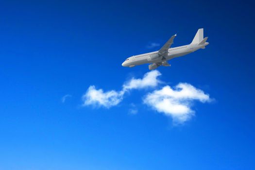 Airliner landing against a blue sky.