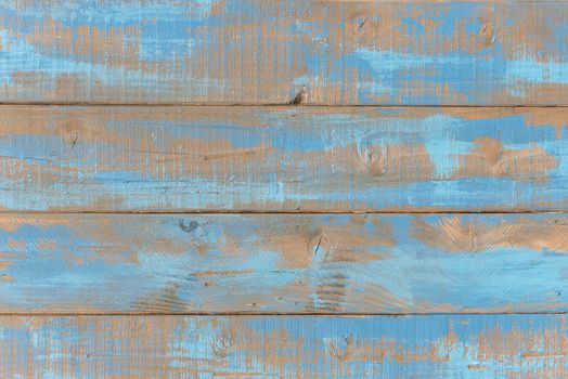 Old weathered blue wooden shelves
