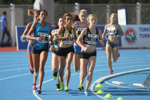 ISTANBUL, TURKEY - SEPTEMBER 19, 2015: Athletes running 1500 metres during European Champion Clubs Cup Track and Field Juniors Group A