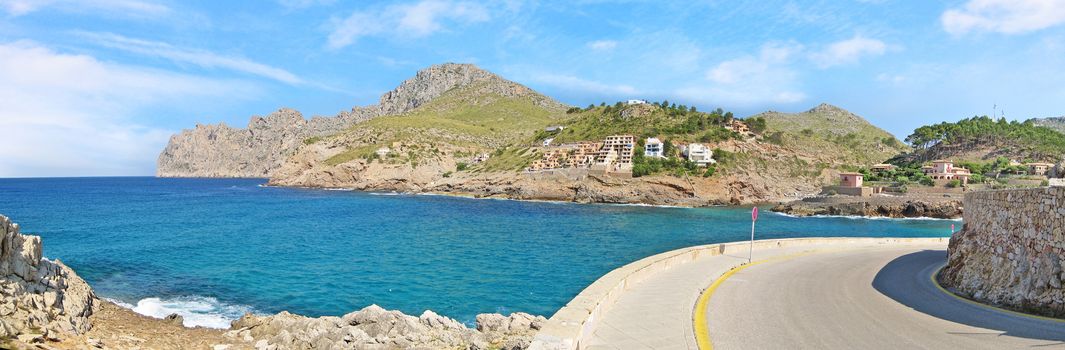 Curve asphalt panorama, bay Cala Molins in Cala Sant Vicenc, Majorca