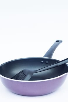 Non stick frying pan on white background