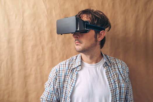 Man with VR goggles exploring virtual reality content