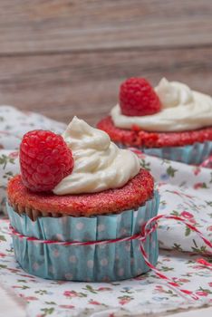 Red cupcakes with cream cheese frosting