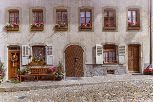 Facade of a historical house in Gruyere village, Switzerland
