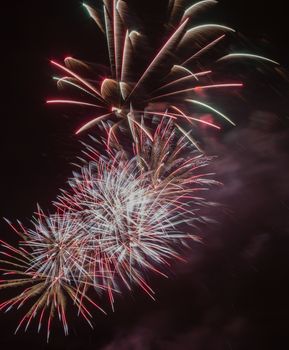 Brightly colorful fireworks and salute of various colors in the 