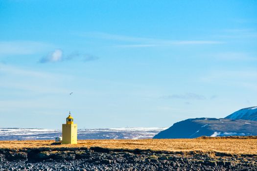 Lighthouse in an icelandic landscape