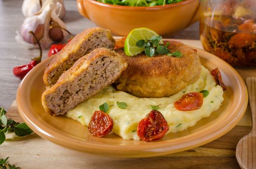 Minced meat schnitzel with cheese