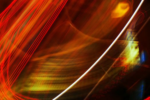 Abstract long exposure image of colorful city street light as urban background