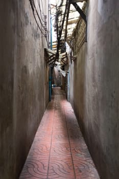 narrow way between building in Bangkok China Town
